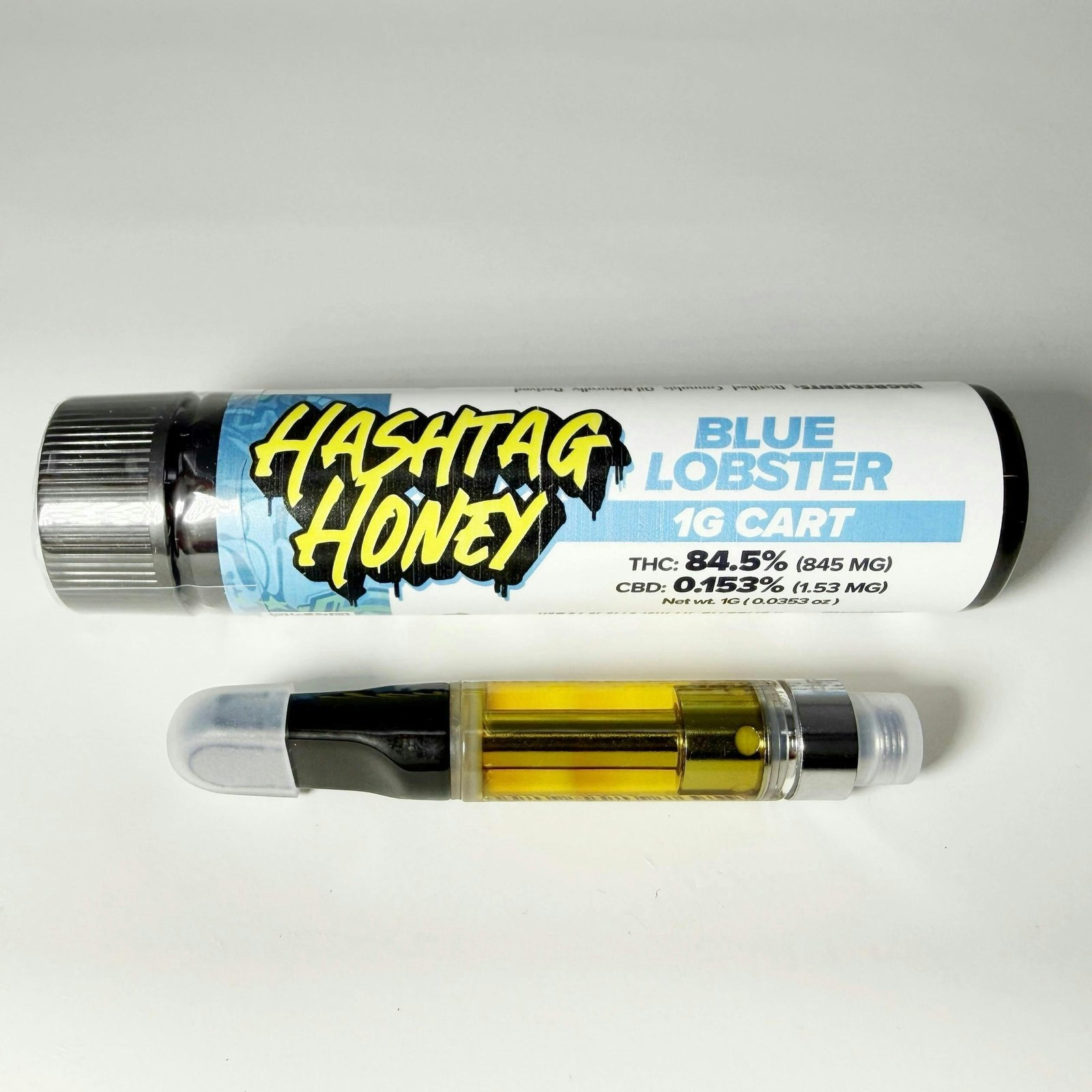 Cartouche Hashtag Honey Blue Lobster 1G à côté de son tube
